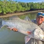 Barra Fishing NT -Captain Dan with a giant Barramundi in Northern Territory