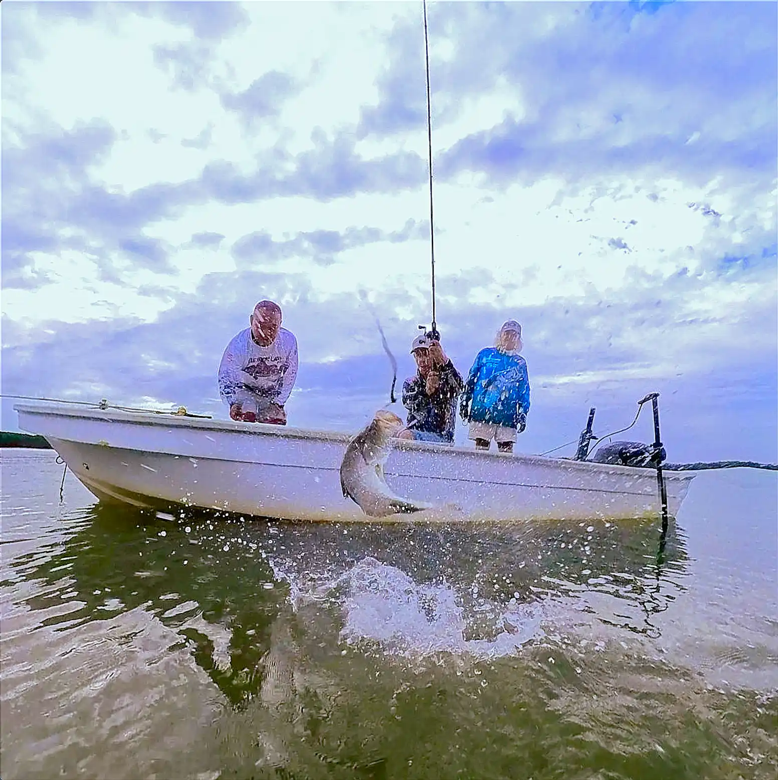Fishing from a tender, catching barramundi guided by Captain Dan Bergamo of Australian Sportfishing Charters